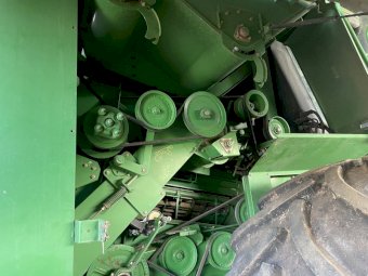 2009 John Deere 9870 STS Header with 2009 Mid West 42 ft Crophawk front and Trailer