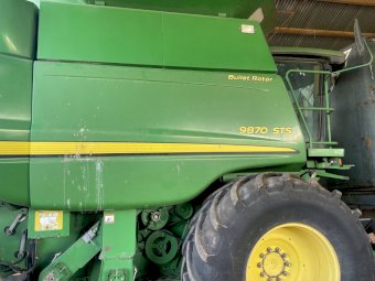 2009 John Deere 9870 STS Header with 2009 Mid West 42 ft Crophawk front and Trailer