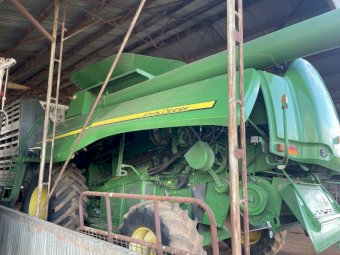 2009 John Deere 9870 STS Header with 2009 Mid West 42 ft Crophawk front and Trailer