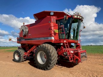 2005 Case IH 2388 Extreme with 36ft 2042 Draper Front on 3 Axle Trailer