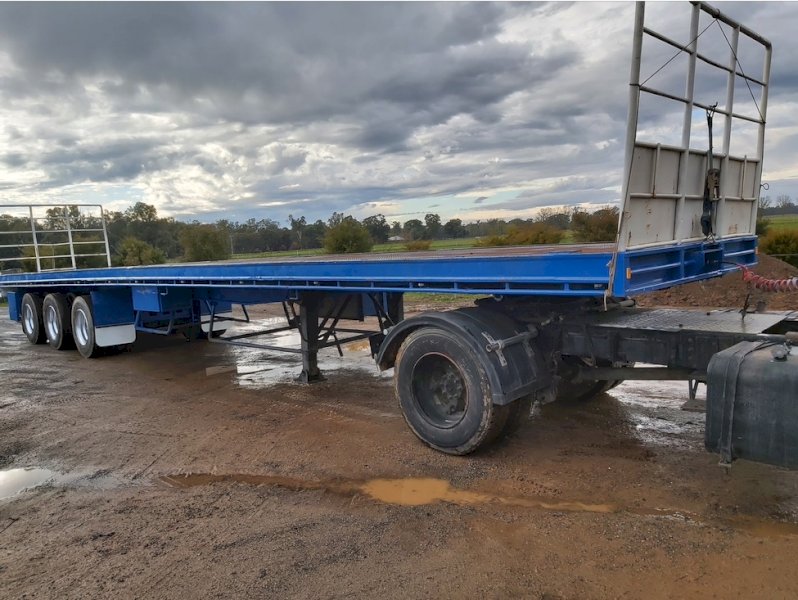Under Auction - (A159)  48ft Fruehauf Flat Top Triaxle Trailer 