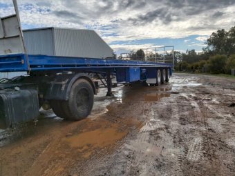 Under Auction - (A159)  48ft Fruehauf Flat Top Triaxle Trailer 