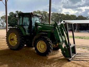John Deere 7410 with JD 740 Loader