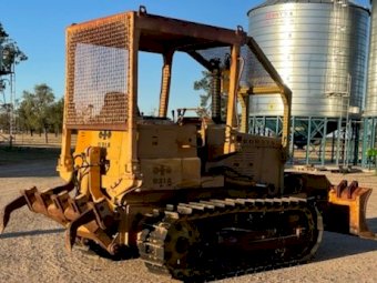 Komatsu  D31A Dozer with stick rake and Tree push