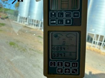 2002 John Deere 9750 STS header with 936D front and trailer.