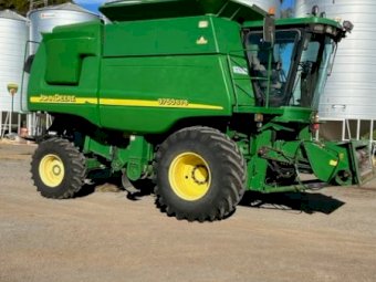 2002 John Deere 9750 STS header with 936D front and trailer.