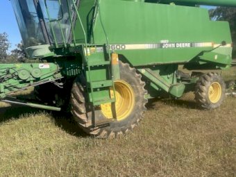 John Deere 9600 with 930 Front on Trailer