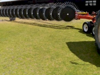 Schinckel 15 wheel one way hay rake