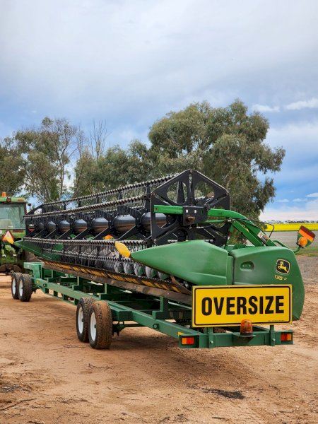 Under Auction - (A252) John Deere 635 Hydraflex Front and Trailer 