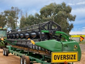 Under Auction - (A252) John Deere 635 Hydraflex Front and Trailer 