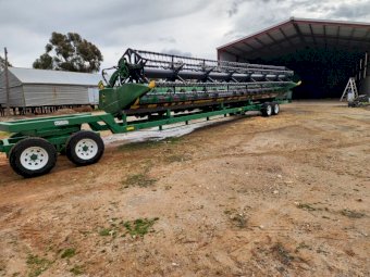 Under Auction - (A252) John Deere 635 Hydraflex Front and Trailer 