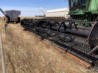 John Deere 9750 STS Header with MacDon 36 ft Front