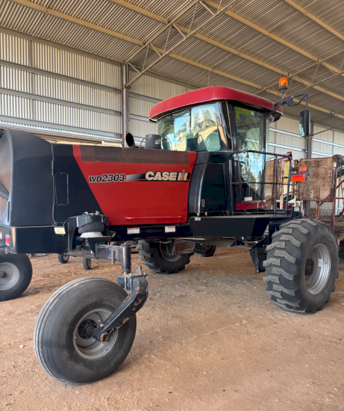 Case IH WD 2303 Windrower with HoneyBee Front and Trailer