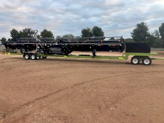 2023 Macdon D145 Front with Leith Contractor Trailer