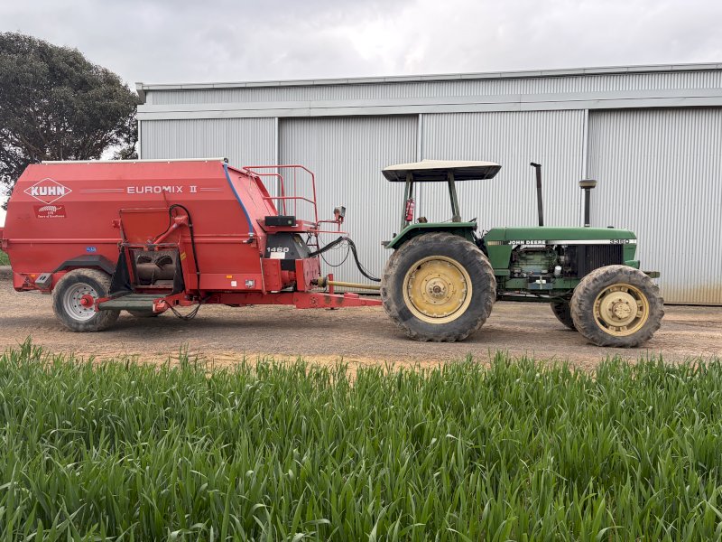 John Deere 3350 Tractor with Kuhn 1460 Euromix II dual horizontal feed mixer