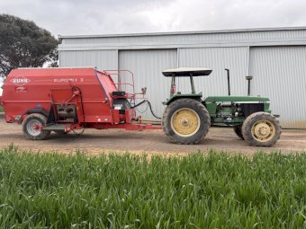 John Deere 3350 Tractor with Kuhn 1460 Euromix II dual horizontal feed mixer