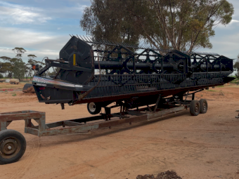 MacDon 972 Flex 30ft Draper Front on Trailer