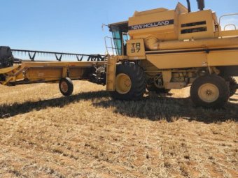 New Holland TR97 Header with Front and Trailer