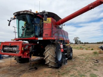2013 Case IH 8230 4WD Header with Case IH 2152 40' Draper Front on Leith Trailer