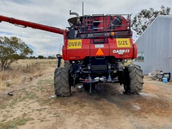 2013 Case IH 8230 4WD Header with Case IH 2152 40' Draper Front on Leith Trailer