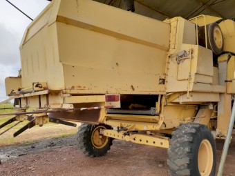 New Holland 8080 header with 30 foot front on trailer
