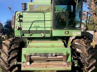 John Deere 7720 Titan 2 4wd Header with 220 Front