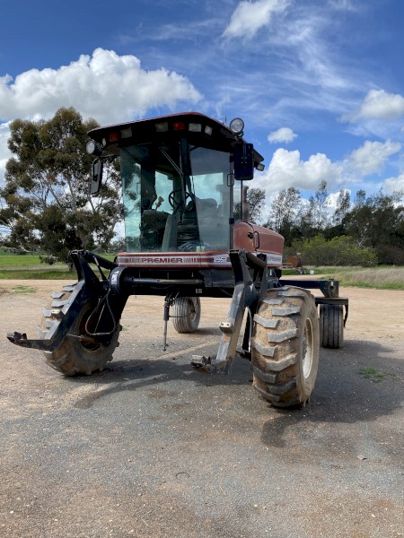 2002 9352 premier windrower with MacDon 972 Draper front, countrywide vertical knives, trailer and carrier