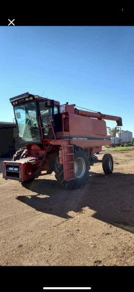 1994 Case IH 1660 Header with 30ft MacDon Draper Front on Trailer
