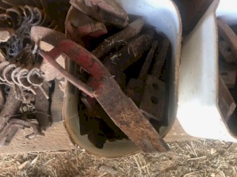About 30 Agmaster knife points, closer plates/boot mounts and sowing boot assemblies, plus trash deflectors