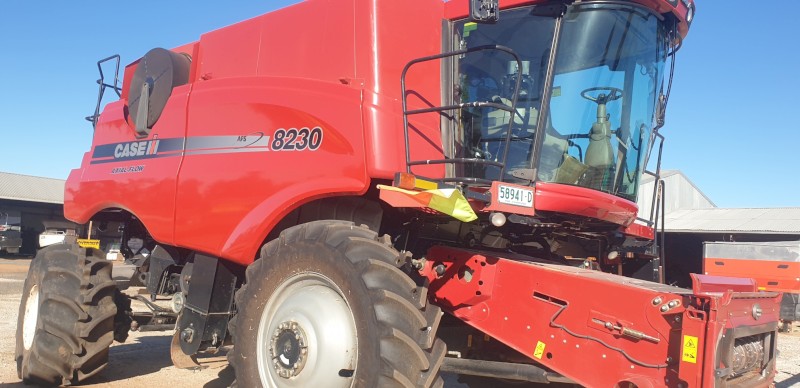 2012 Case IH 8230 Header + NH 8400C 35ft Front with trailer.