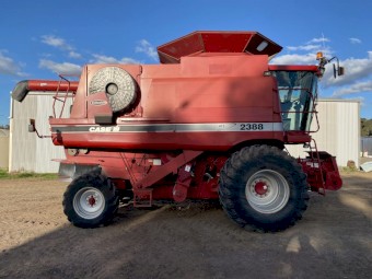 2003 Case IH 2388 X-Clusive with a case 2142 Draper front