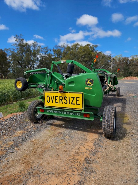 John Deere 615P Pick up front with Coolamon Steelworks trailer 