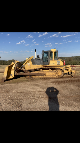 2006 Komatsu D65ex-15eo and Gessner Stick Rake.