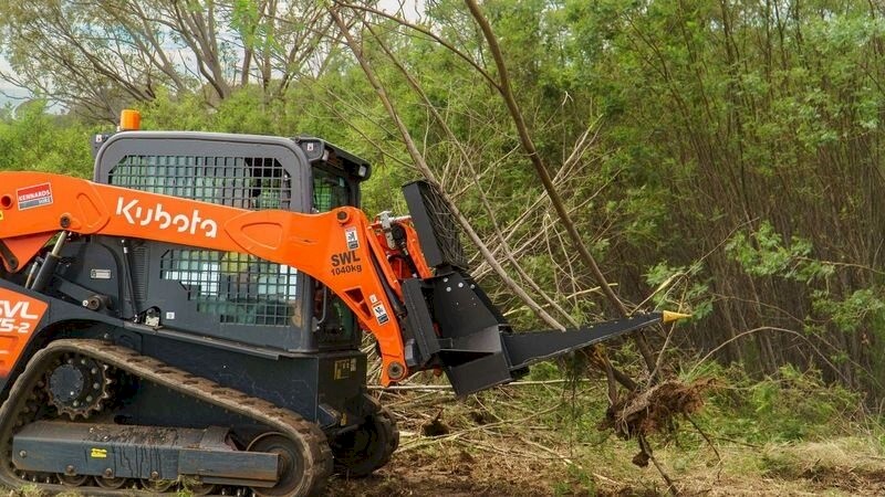 TREE PULLER SKID STEER ATTACHMENT.