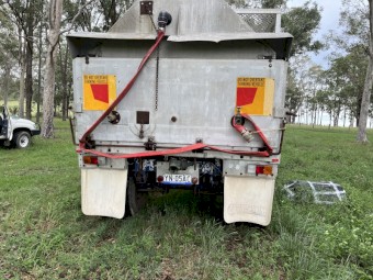 Enclosed semi tipping trailer