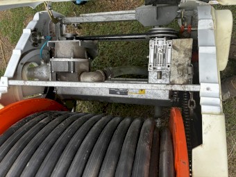Hard hose irrigator