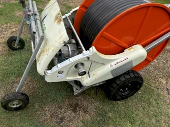 Hard hose irrigator
