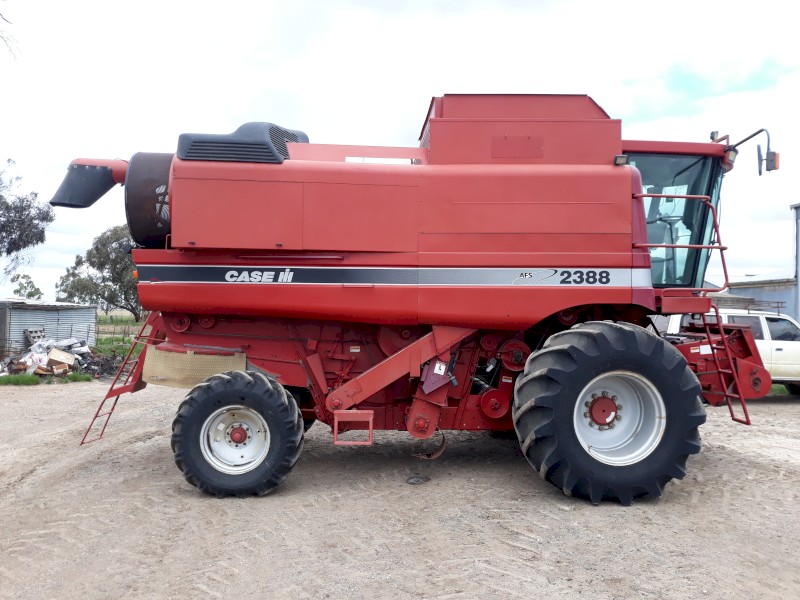 2000 Case 2388 & 36' Macdon on trailer 