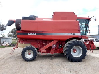 2000 Case 2388 & 36' Macdon on trailer 