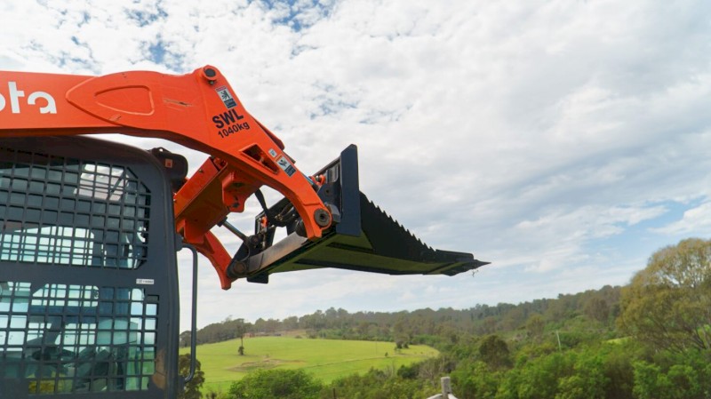 SKID STEER STUMP BUCKET TREE REMOVER.