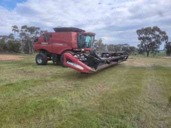 2010 CaseIH 8120 4WD Header with 40ft 2152 CaseIH (macdon) front and trailer
