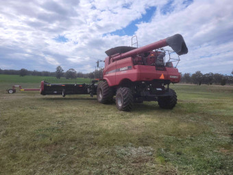 2010 CaseIH 8120 4WD Header with 40ft 2152 CaseIH (macdon) front and trailer