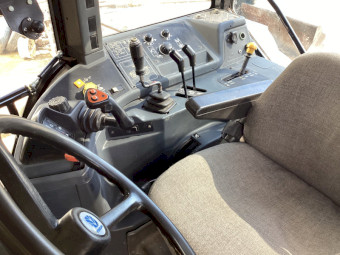 New Holland 8360 with FEL