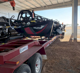 2023 Macdon D140 Header Front on 4 axle Leith Trailer