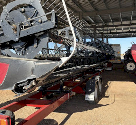 2023 Macdon D140 Header Front on 4 axle Leith Trailer