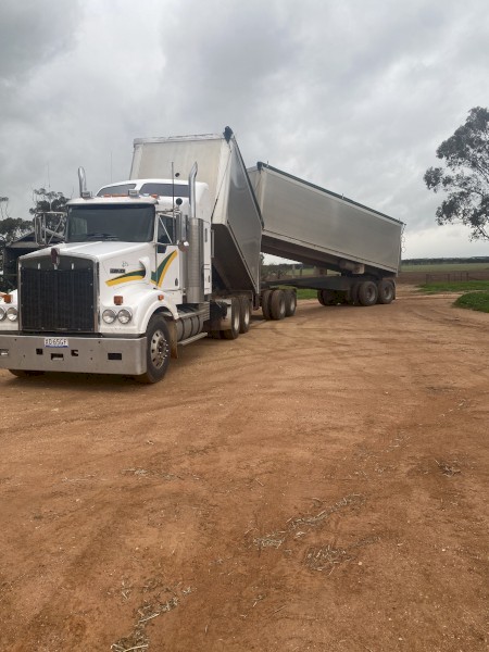 2010 Kenworth T408 SAR with Quad Dog Fitted with a Blower on Truck and Dog