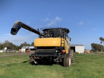 New Holland CR970 with 94C front on Leith trailer 