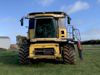 New Holland CR970 with 94C front on Leith trailer 
