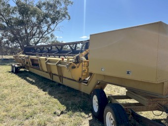 CAT Lexion 460 Header with Front and Trailer